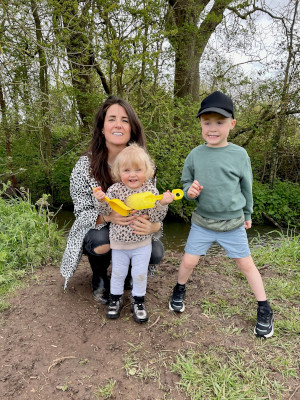 Laura Creane running with her children.jpg